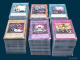 a lot of cards that are stacked on top of each other