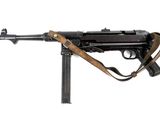 a close up of a machine gun on a white background