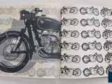 an open book with a picture of a motorcycle on it