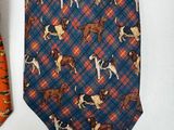 two ties that have dogs on them on them