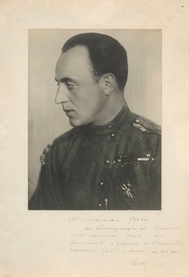 an old black and white photo of a man in a military uniform