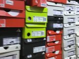 a lot of boxes that are stacked on a shelf