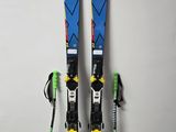 a pair of skis that are leaning against a wall