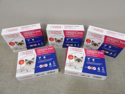 four boxes of catnip for sale on a table