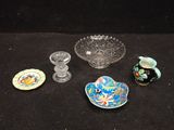 a lot of glass items on a black table