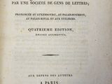 an old book with a black and white image of the title of a poem