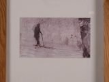 framed photograph of a man on skis and a woman on a snowboard