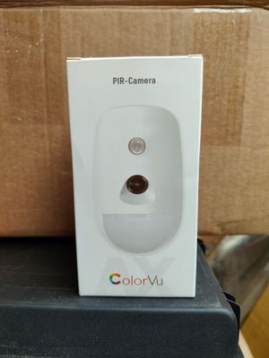a white box with a camera on top of it