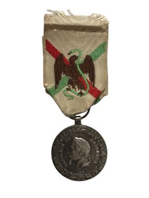 une image représentant une médaille sur laquelle figure le portrait d'un homme
