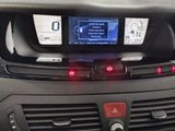 a car dashboard with a digital display on it