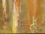 a painting of a man on a bike on a rusted wall
