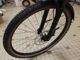a close up of a bicycle on display in a store