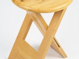 wooden folding stool on white background with white background