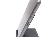 a close up of a cell phone on a stand