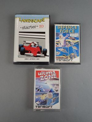 three video game cartridges are sitting on top of a table