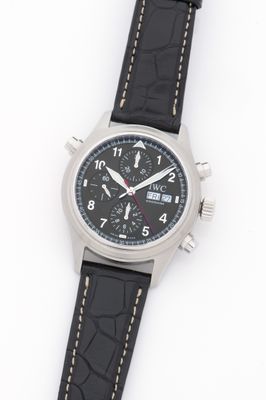 an image of a close up of a wrist watch on a white surface