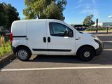 a white van that is parked in a parking lot