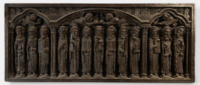 an image of a bronze plaque of a group of people
