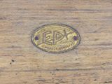 a close up of a wooden box with a label on it