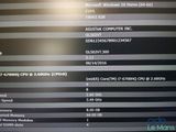 a large screen displaying a list of computer hardware