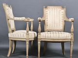 pair of louis xvi style armchairs with stripped upholstered upholstered arms