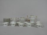 an image of a group of porcelain dishes and cups on a table