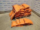 a pile of bags of sand sitting on a pallet