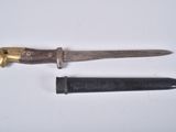 two different types of knives on a white surface