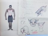 several drawings of a man and a bull are on a piece of paper