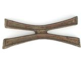 an image of a pair of old iron tongs on a white surface