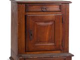 une vieille armoire en bois avec deux tiroirs et un tiroir en dessous