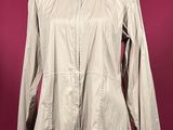 a beige leather jacket on a mannequin mannequin mannequin mannequin mannequin mannequin mannequin mannequin manne