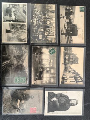 a lot of old black and white photos on the wall