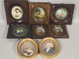 six framed miniature portraits of people in a wooden case