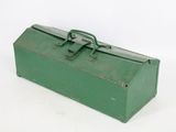 a green metal tool box with a handle on it