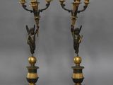 pair of antique bronze candlesticks with cher chers and cher chers