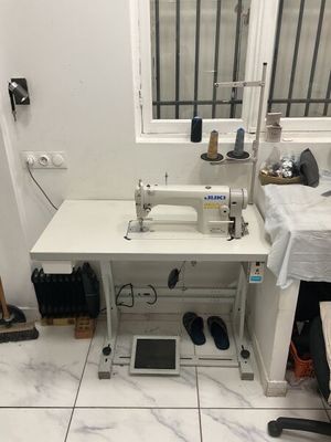 an image of a sewing machine in a small room