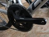 a close up of a bike with a chain attached to it