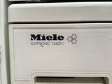 a close up of a white refrigerator with a label on it
