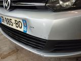 a close up of the front of a car with a license plate on it
