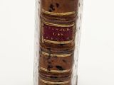 an old book that has been turned into a vase