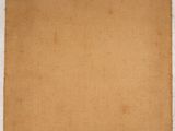 an old photo of a piece of paper hanging on a wall