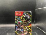 a close up of a box of pokemon cards on a table