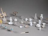 a lot of miniature objects that are on the table
