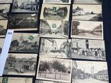 a lot of old black and white photos on the table