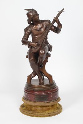 an image of a bronze statue of a man holding a sword