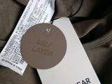 the label on a pull and bear t - shirt is attached to a hanger