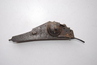 an old, rusty metal object on a white surface with a white background