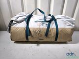 a bag with a drawing on it sitting on a table