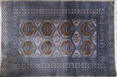 a blue and brown rug with a pattern on it